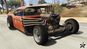 Vue avant du Declasse Tornado rat rod, la voiture est orange