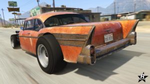 Vue arrière du Declasse Tornado rat rod peint en orange.