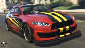 La voiture 8F Drafter de couleur rouge vue de devant, elle possède le motif "Rues urbaines" sur sa carrosserie.