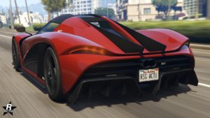 Vue arrière de l'Överflöd Entity MT dans le jeu Grand Theft Auto Online. Le véhicule est de couleur rouge foncé