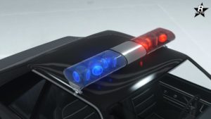 Les avertisseurs lumineux de police "Avertisseurs lumineux custom 3" de couleurs bleu et rouge sur le toit de la Dominator FX Cruisser