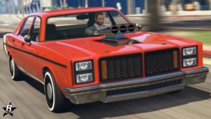 Vue avant d'une grosse cylindrée rouge, il s'agit de la voiture américaine Bravado Greenwood