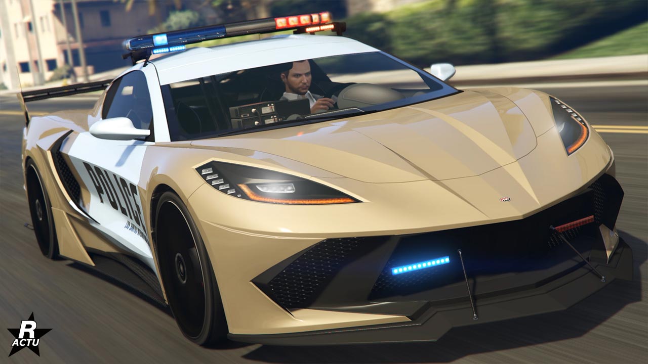Image présentant la voiture de police "Invetero Coquette D10 de poursuite" vue de l'avant dans GTA Online. Elle dispose d'une peinture duochrome blanche et beige, une décalcomanie indiquant en grand "police" sur ses portières.
