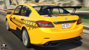 Image de la voiture japonaise Dinka Chavos V6 dans GTA Online, sa carrosserie est de couleur jaune et elle dispose d'une décalcomanie hexagonale.