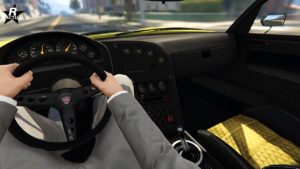 Vu du point de vue du conducteur conduisant la voiture Bravado Banshee GTS dans le jeu vidéo GTA Online.