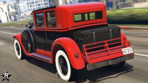 Image de l'arrière de la voiture Albany Roosevelt Valor dans le jeu GTA Online. Le véhicule dispose d'une peinture duochrome rouge et noire.