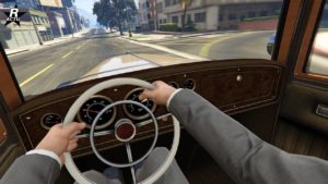 Image montrant le point de vue du conduire lors de la conduite de la voiture Albany Roosevelt dans le jeu vidéo GTA Online.