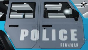 Logo de la police du quartier "Richman" de Los Santos sur les portières du véhicule de flics.