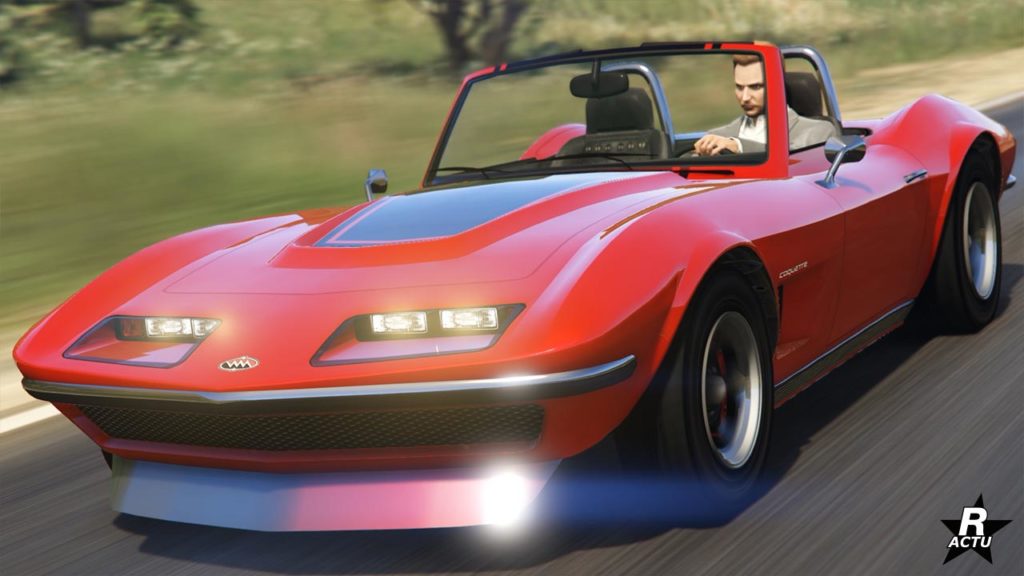 Vue avant du véhicule américain Coquette Classique de chez Invetero. Le bolide ancien décapotable est peint en rouge à l'exception du centre du capot qui est de couleur noire.