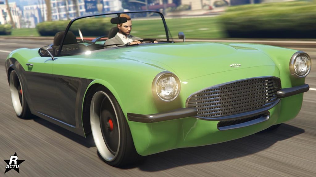 Image présentant une vue avant de la voiture Invetero Coquette BlackFin dans GTA Online. Le véhicule ancien est peint en vert fluo, à l'exception du bas des ailes latérales qui sont de couleur gris métallisé. Le bolide est dans sa version décapotable sans toit.