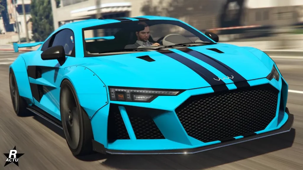 L'avant du bolide de sport Obey 10F Large sur une route ensoleillés du jeu vidéo GTA Online de Rockstar Games. La voiture a sa carrosserie peinte en bleu fluo avec une décalcomanie d'une double bande noire traversant verticalement le capot en son centre.