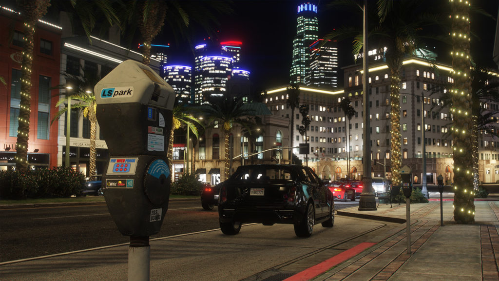 Vue des buildings du centre de Los Santos la nuit, où les lumières des immeubles, illuminent la ville de GTA V.