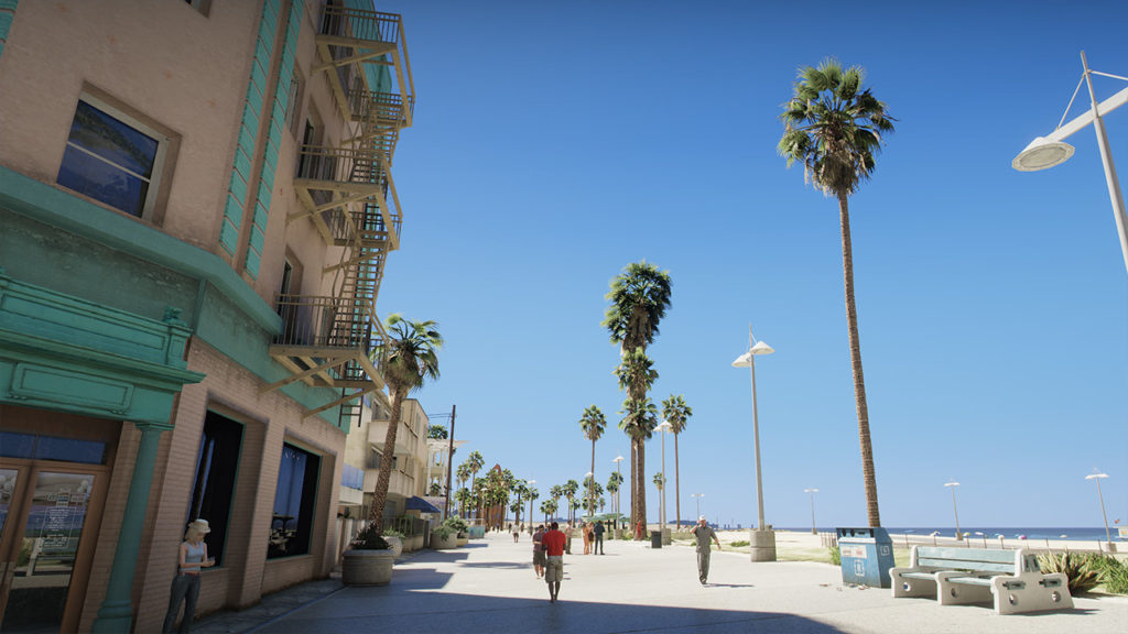 Rue piétonne le long de la plage de Los Santos, les commerces sur la gauche ont le soleil derrière les bâtiments, portant une ombre au sol.