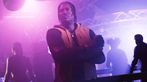 Dre’Quan Priest sous des lumières roses dans un nightclub.
