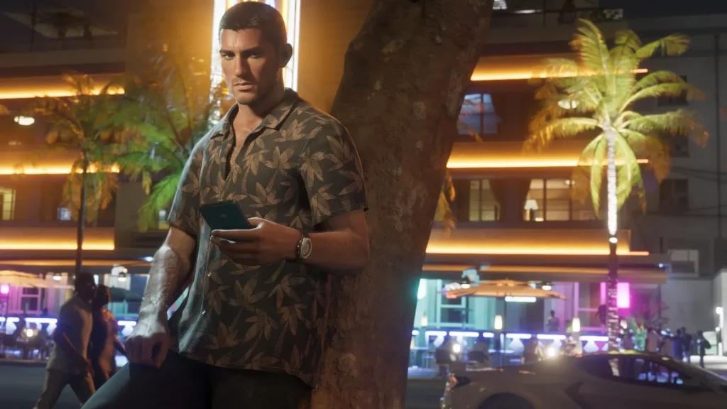 Jason Duval adossé à un palmier de nuit dans la ville de Vive City où les néons des hôtels en arrière-plan illuminent.