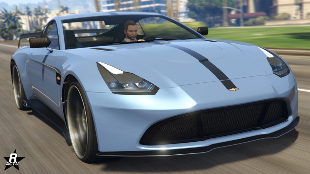 Vue avant du véhicule anglais Rapid GT X, sa carrosserie est peinte dans un bleu ciel et un petite bande verticale noire est présente sur le capot en son centre.
