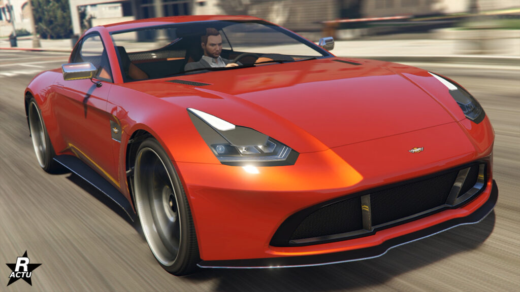 Véhicule anglais Rapid GT X du constructeur britannique Dewbauchee dans le jeu GTA Online. Le bolide dispose sur l'image d'une carrosserie peinte en rouge avec des reflets dorés.