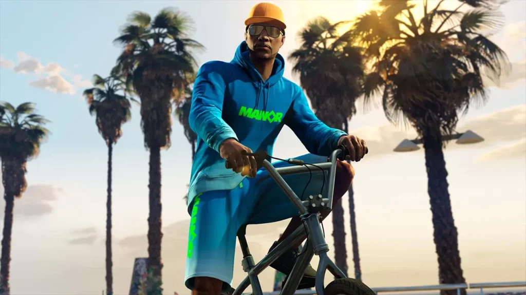 Un joueur de GTA Online sur un vélo BMX portant le short Manor bleu et le sweat Manor bleu sur lui.