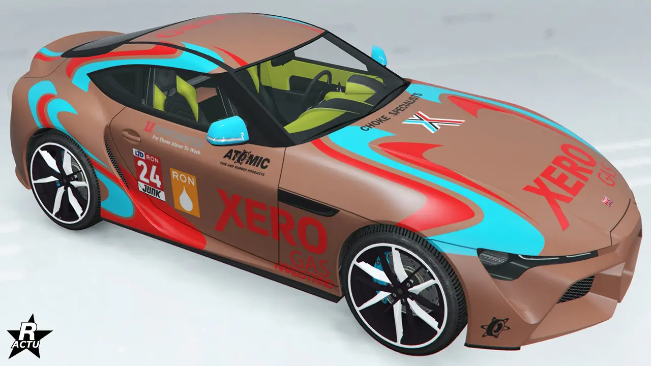 Motif "Rallye Xero Gas" ajoutant une décalcomanie d'une vague bleu clair et rouge traversant le capot et le toit. Le logo de la compagnie "Xero Gas" apparaît en rouge sur le capot et les côtés latéraux.