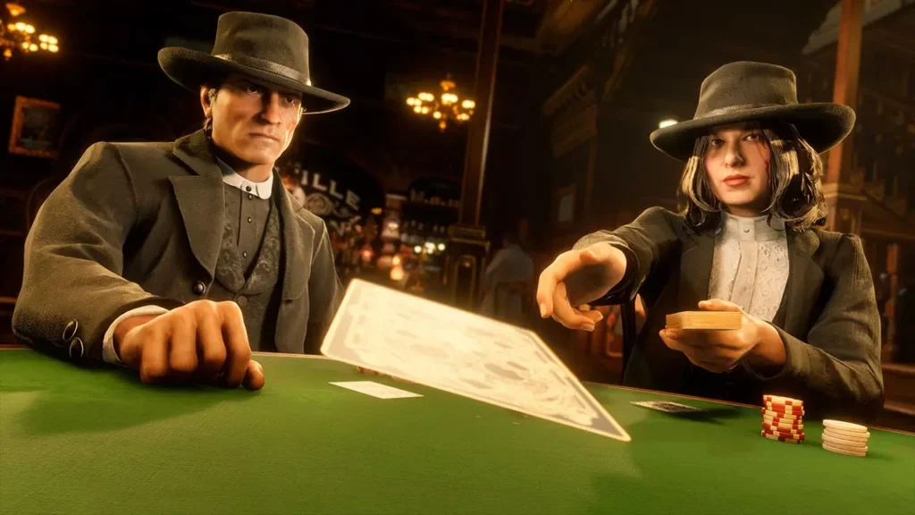 Tenue communautaire du mois de septembre 2025. Deux personnages de Red Dead Online portent la tenue créée par le joueur "Legitimate_Tie_6620". Il s'agit d'un costume de flambeur tout en noir, les deux personnages sont assis à une table de poker et lance une carte au centre de l'image sur la table.