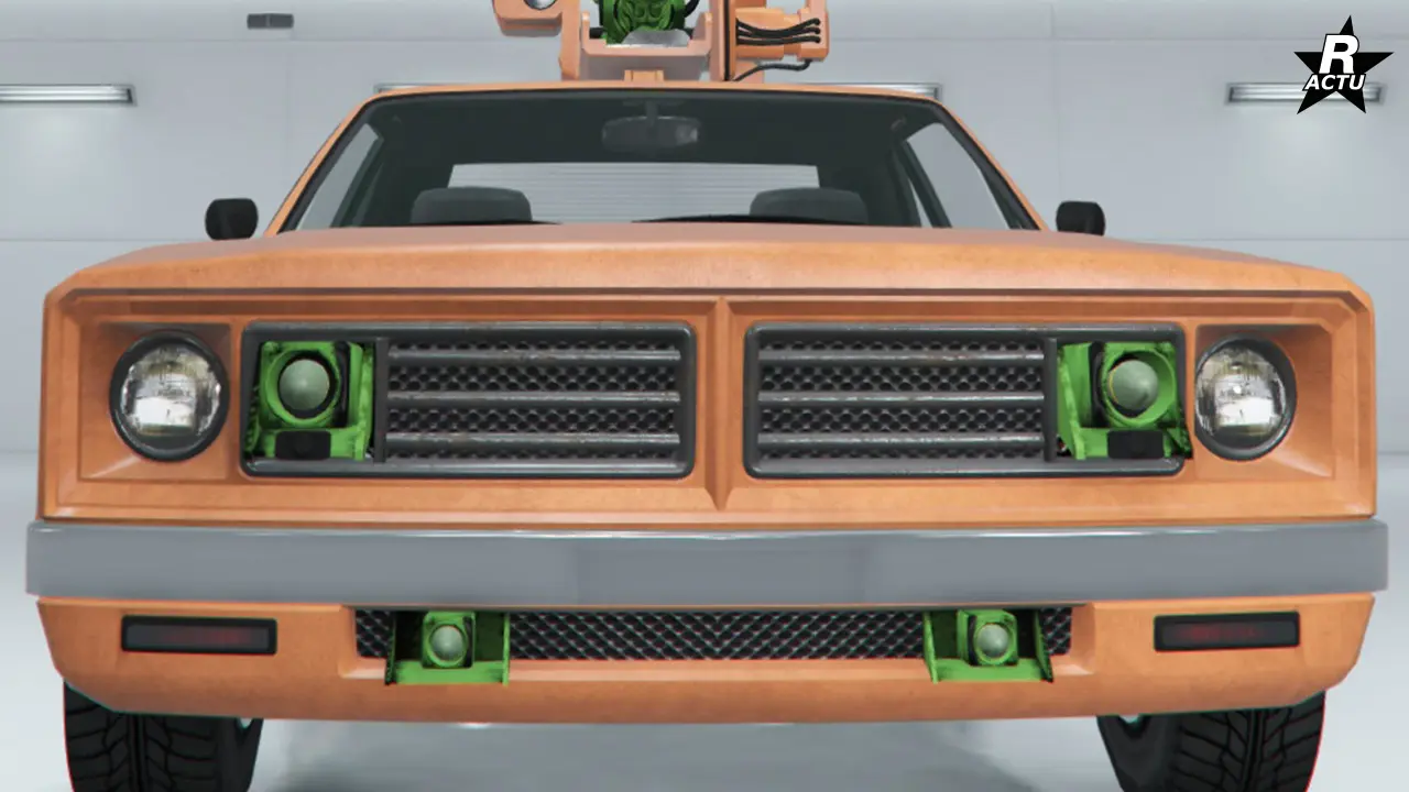 Calandre avant disposant dans sa grille, quatre tube de lance-missiles, peint dans la couleur secondaire (en vert sur l'image).