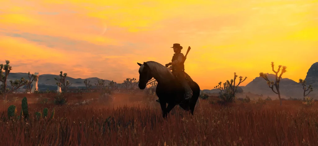 John Marston sur son cheval, avec un couché de soleil en arrière plan