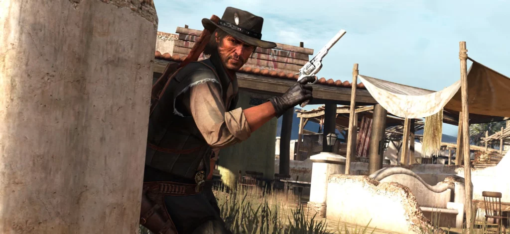 John Marston à couvert derrière un mur, tout en regardant vers le spectateur de l'image. 