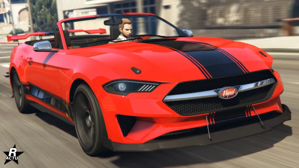 L'avant de la version drift de la grosse cylindrée décapotable "Vapid Dominator GT" peinte en rouge et avec une bande noire traversant la carrosserie.