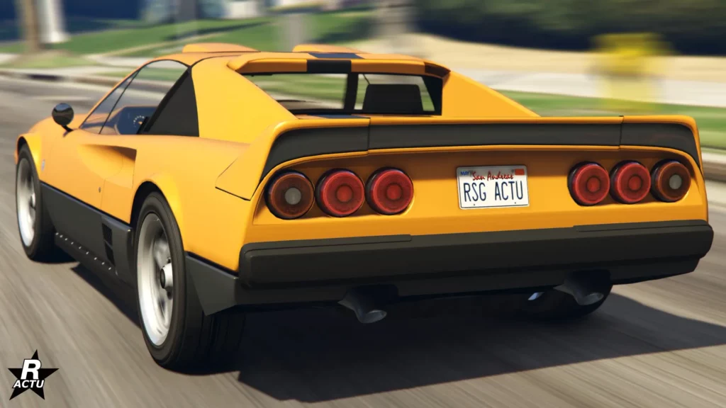 Vue arrière du bolide rétro Grotti Itali Classique. La voiture de sport est peinte en orange.