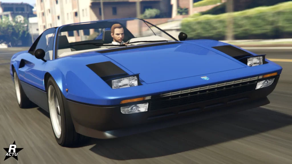 L'avant du véhicule rétro Grotti Itali Classique dans le jeu vidéo GTAO. La carrosserie est peinte en bleu et gris anthracite pour son bas de caisse.