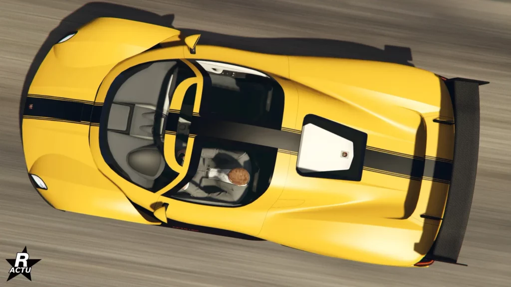 Vue du dessus de la Pfister X-treme, peinte en jaune avec une bande noire traversant la carrosserie.