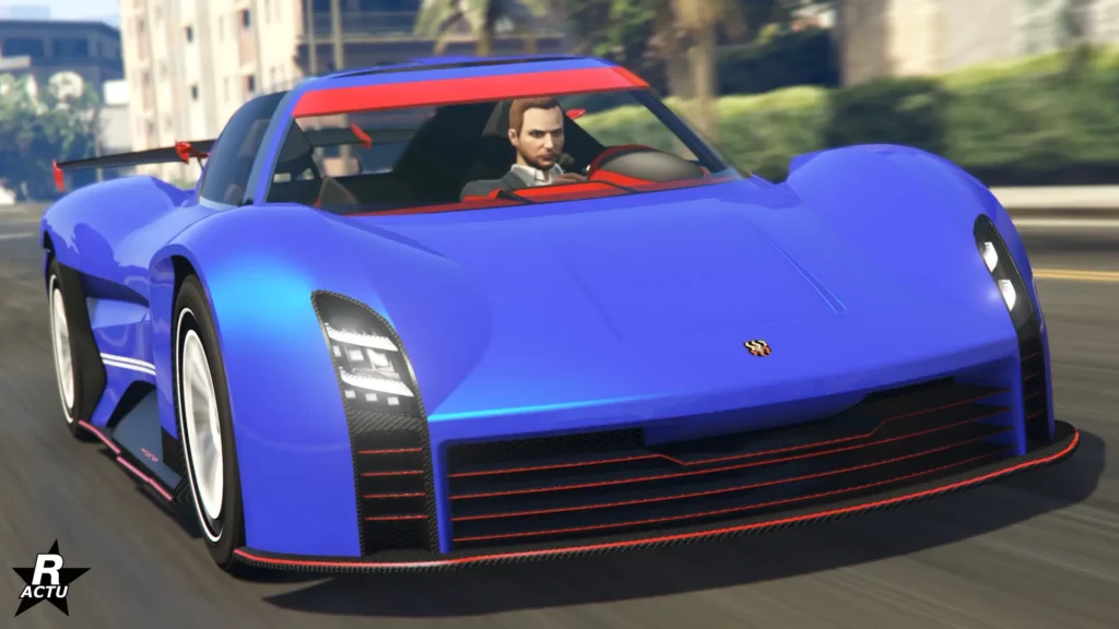 L'avant de la super car électrique Pfister X-treme sur une route de GTA Online. La carrosserie du véhicule est peinte en bleue avec des finitions rouges au niveau du pare-chocs avant et sur le pare-soleil.