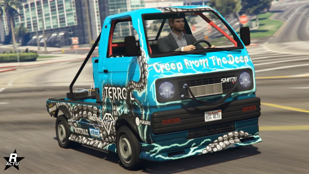 L'avant de la camionnette Shitzu Keitora peinte en bleu ultra, avec des options de drift et une décalcomanie de tentacules de Kraken sur sa carrosserie.
