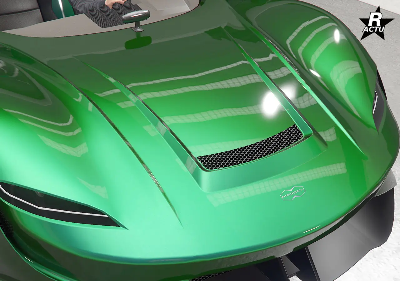 Capot avec bombage et grille d'aération moteur rectangulaire sur la partie inférieure du capot.