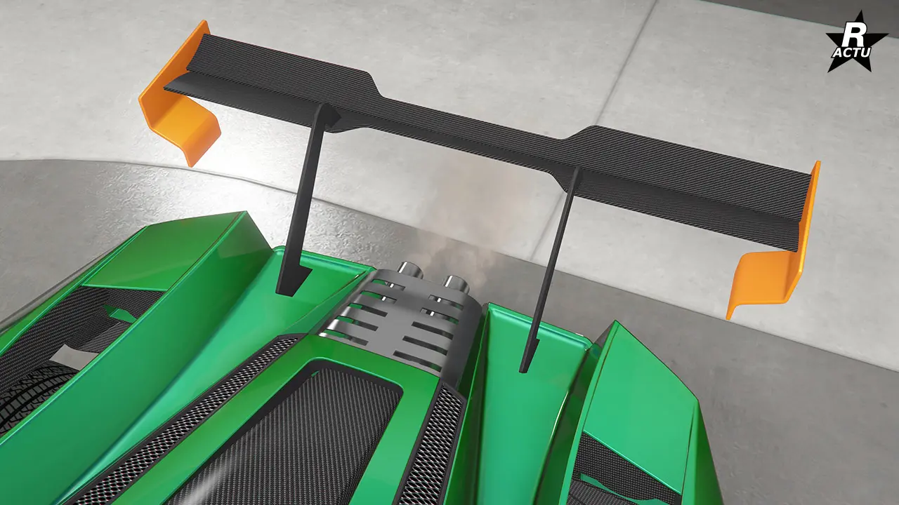 Aileron de course en carbone, biseauté au centre, avec ailettes latérales couleur secondaire.