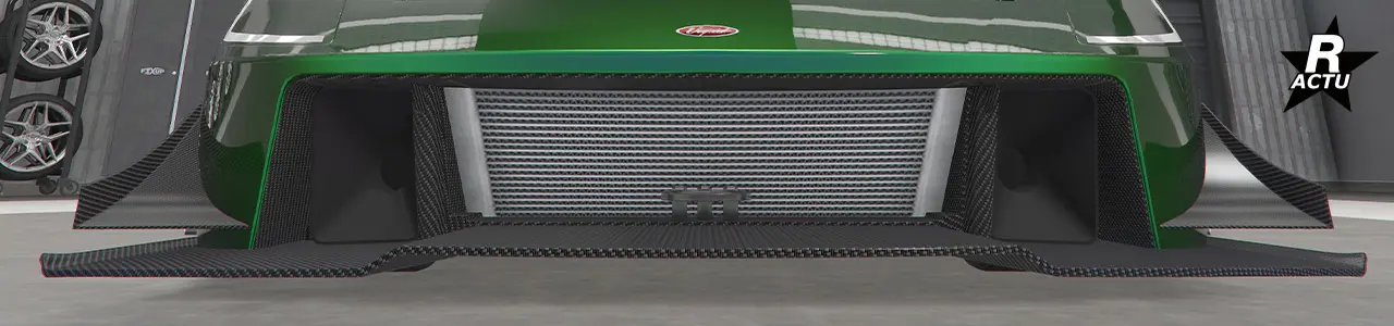 Grande ailette aérodynamique en carbone de parte et d'autres du pare-chocs avant.