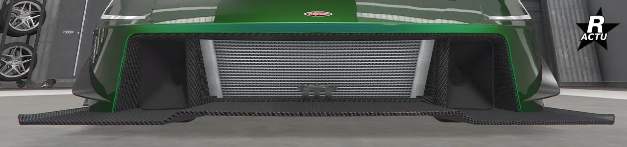 Simple ailette aérodynamique en carbone de parte et d'autres du pare-chocs avant.