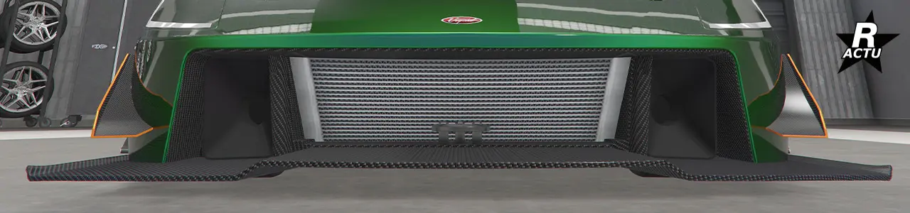 Ailette aérodynamique de taille moyenne en carbone avec finitions couleur secondaire de parte et d'autres du pare-chocs avant.