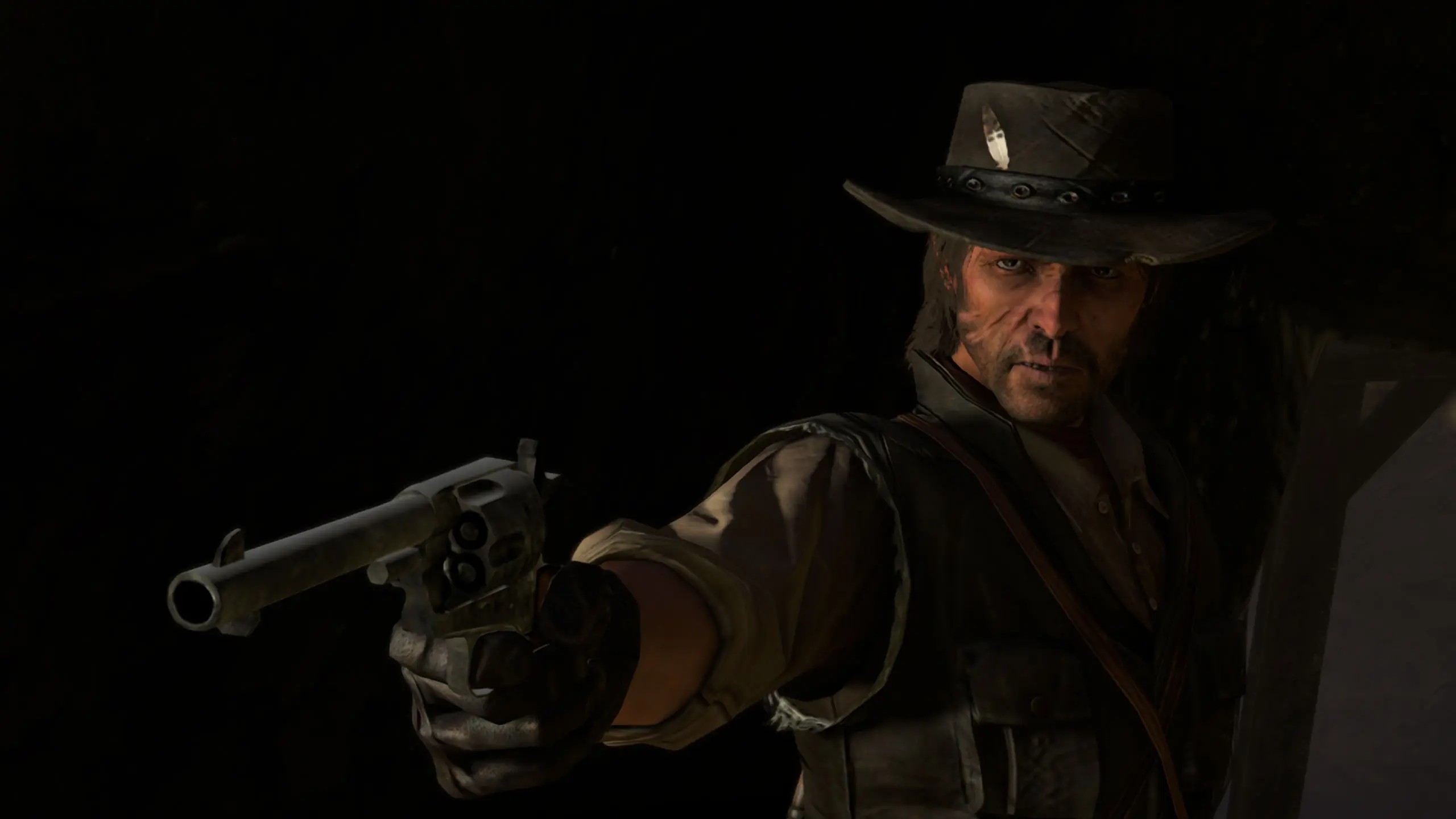 John Marston sortant son révolver dans un endroit très sombre. Image capturée sur Nintendo Switch 2.