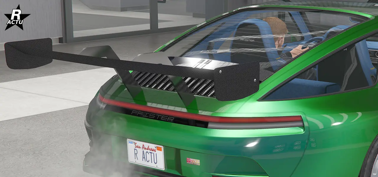 Aileron imposant en fibres de carbone, soutenu par le dessus avec deux fixations chromées.