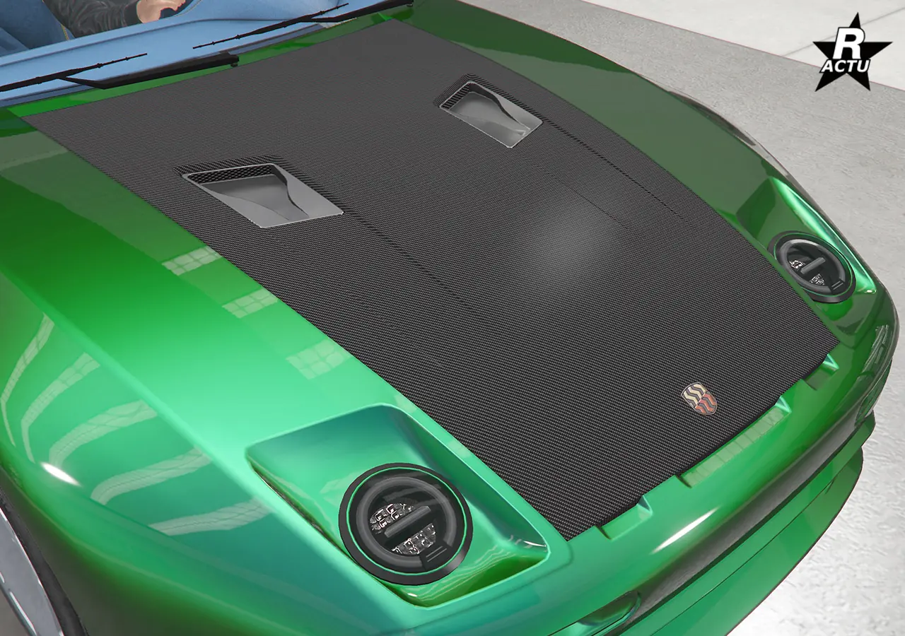 Capot en fibres de carbone avec deux encoches noires au centre du capot.