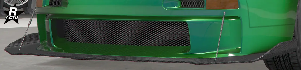 Séparateur aérodynamique aux bouts ailés en fibres de carbone, et avec tiges de fixations en aluminium reliant le séparateur avec le haut du pare-chocs avant.