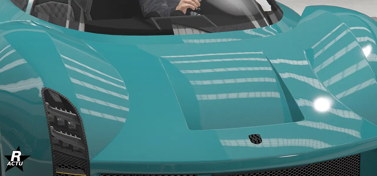 Capot avec prise d'air ventilé dans le renfoncement au centre de celui-ci