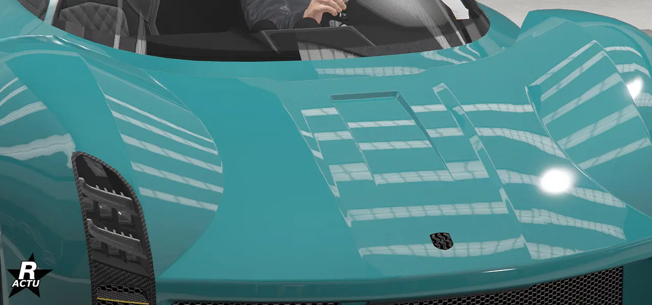 Capot avec rabaissement rectangulaire au centre du capot.