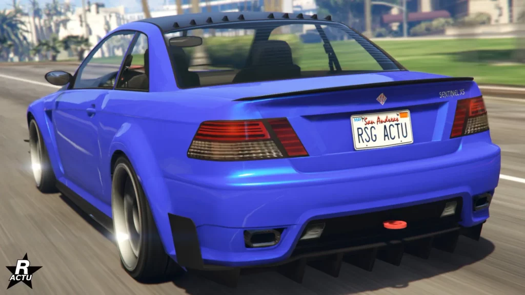 Image présentant la voiture Ubermacht Sentinel XS avec une vue arrière de cette dernière. La couleur de la carrosserie est bleu à l'exception de son toit, peint en noir.