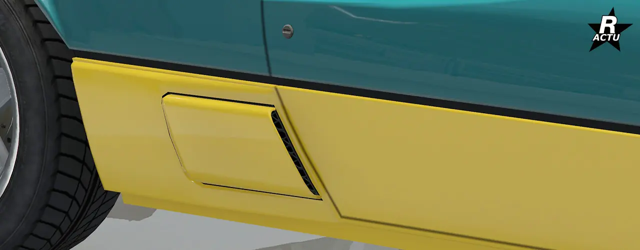 Prise d'air latéral recouvert d'un cache couleur secondaire entre la porte du véhicule et la roue arrière.