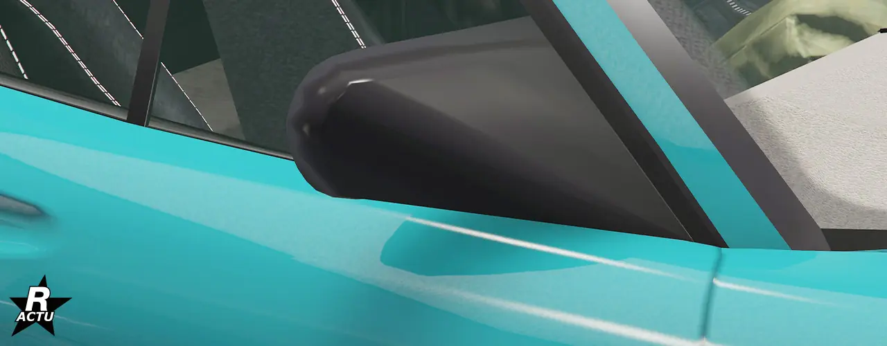 Rétroviseur de forme pyramidale d'un seul bloc de couleur noir.