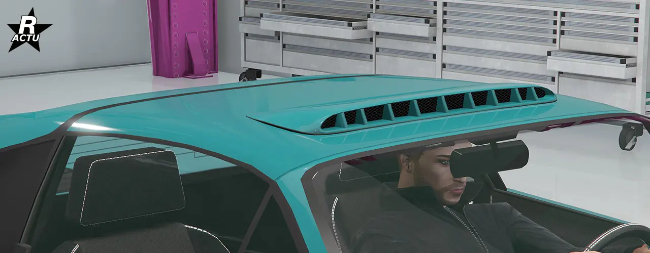 Large prise d'air avec lamelles verticales sur le toit et au centre de celui-ci.