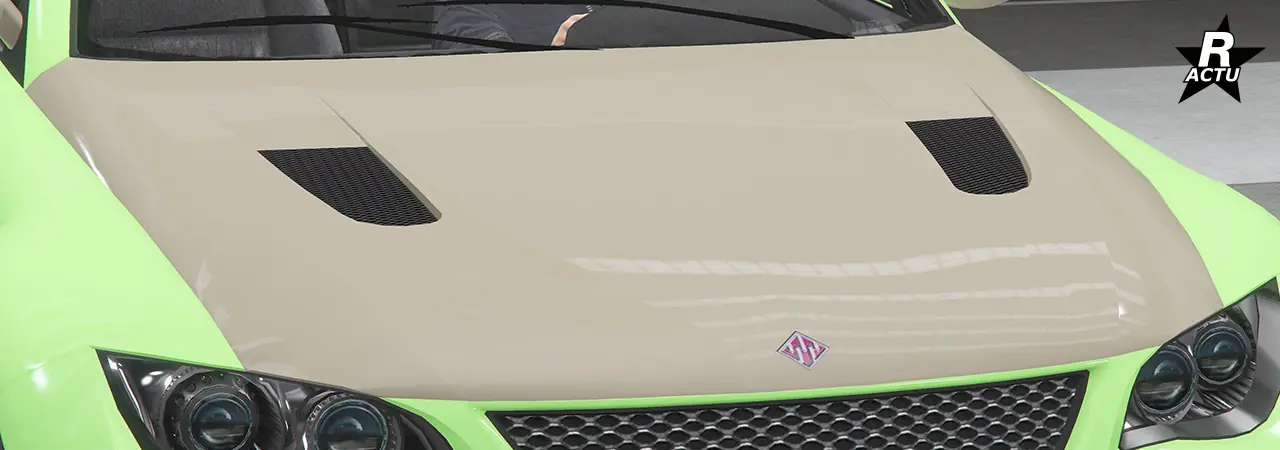 Option d'un capot peint dans la couleur secondaire du véhicule et qui dispose de deux grilles d'aérations moteur noires rectangulaires de parte d'autres du capot.