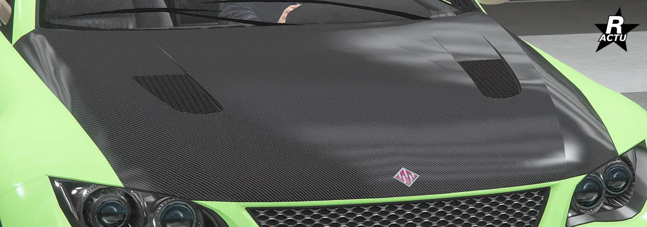 Option qui remplace le capot d'origine de la voiture par un capot en fibres de carbone qui dispose de deux grilles d'aération moteur noires et rectangulaires de chaque côté.